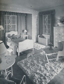 'Nursery by W. & J. Sloane, with cream-coloured furniture and shaggy white rugs on a blue painted fl Artist: Unknown.