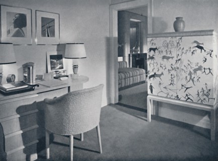 'W. & J. Sloane. Photographer's hobby room showing a desk in natural oak, a hand-woven covering on t Artist: Unknown.