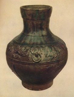 'Wine Jar with Hunting Scene in Relief. Han Dynasty, 206 BC - AD 221, (1927). Artists: Edward F Strange, Unknown.