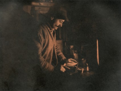 'Ponting Developing a Plate in the Dark Room', c1910?1913, (1913).  Artist: Unknown.