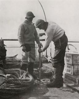 'Dr. Wilson and Dr. Atkinson Loading The Harpoon Gun', c1910?1913, (1913). Artist: Herbert Ponting.