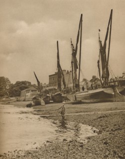 'Barges Aground At Mortlake With The Tide at Full Ebb', c1935. Creator: Donald McLeish.