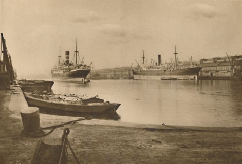 'Carriers of London's Food: Unloaded Cargo Boats in the South Dock of the West India Docks', c1935. Creator: Langfier.