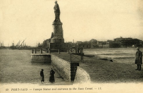 'Port Said. - Lesseps Statue and entrance to the Suez Canal - LL.', c1918-c1939. Creator: Unknown.
