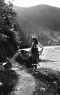 Young woman on a mountain footpath, Bistrita Valley, Moldavia, north-east Romania, c1920-c1945. Artist: Adolph Chevalier