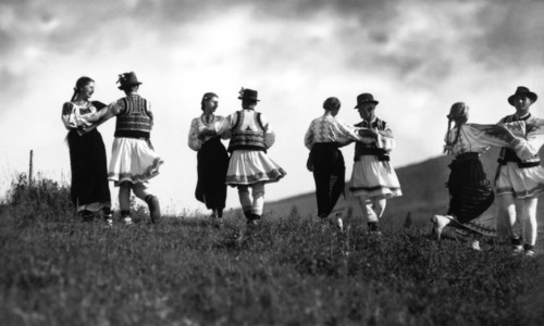 Couples in traditional dress dancing, Bistrita Valley, Moldavia, north-east Romania, c1920-c1945. Artist: Adolph Chevalier