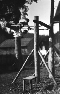 Children playing on a climbing frame, Bistrita Valley, Moldavia, north-east Romania, c1920-c1945. Artist: Adolph Chevalier