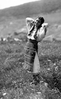 Young woman in traditional costume, Bistrita Valley, Moldavia, north-east Romania, c1920-c1945. Artist: Adolph Chevalier