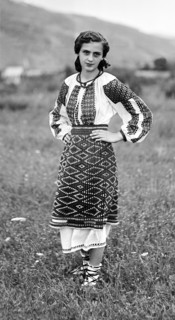 Young woman in traditional dress, Bistrita Valley, Moldavia, north-east Romania, c1920-c1945. Artist: Adolph Chevalier