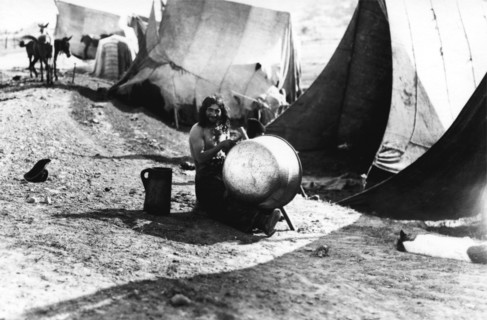 Man with a large pot, Bistrita Valley, Moldavia, north-east Romania, c1920-c1945. Artist: Adolph Chevalier