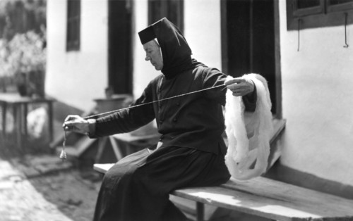 Woman spinning, Bistrita Valley, Moldavia, north-east Romania, c1920-c1945. Artist: Adolph Chevalier