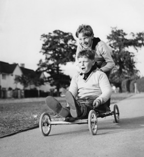 Boys playing with a home-made go-kart, Horley, Surrey, 1965.