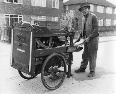 Gipsy knife-grinder with his handcart, Horley, Surrey, 1964.