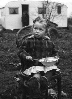 Gipsy girl eating, Lewes, Sussex, 1964.