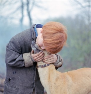 Gipsy boy with a dog, Charlwood, Newdigate area, Surrey, 1964.
