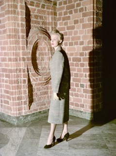 Female model shows a suit, the Historical Museum, Stockholm, 1950s. Artist: Göran Algård