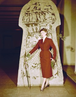 Female model shows a suit, the Historical Museum, Stockholm, 1950s. Artist: Göran Algård