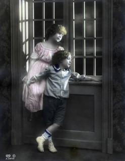 Brother and sister by a window, Sweden, c1900. Artist: Unknown