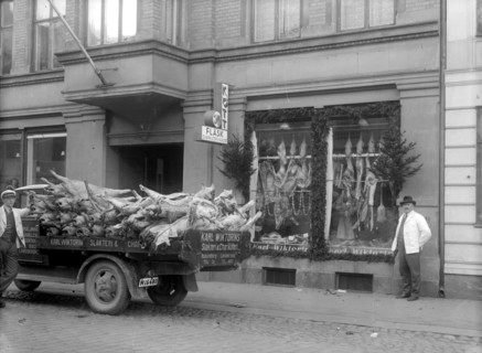 Slaughtered pigs on a lorry outside the butcher's shop. Landskrona, Sweden, 1933. Artist: Unknown