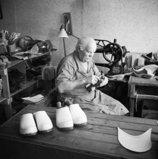 Making wooden clogs, Sweden. Artist: Unknown