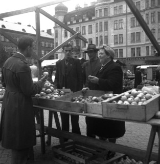 Fruit and vegetable stall in the market, Malmö, Sweden, 1947. Artist: Otto Ohm