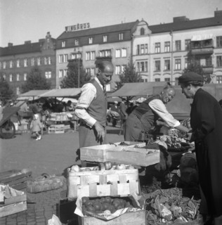 Fruit and vegetable stall in the market, Malmö, Sweden, 1947. Artist: Otto Ohm