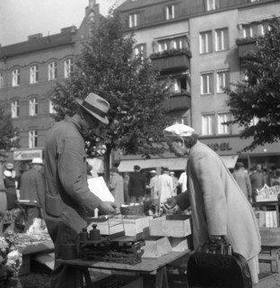 Scene in the market, Malmö, Sweden, 1947. Artist: Otto Ohm
