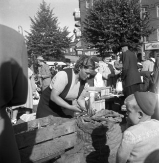 Fruit and vegetable stall in the market, Malmö, Sweden, 1947. Artist: Otto Ohm