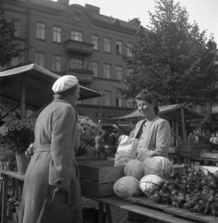 Fruit and vegetable stall in the market, Malmö, Sweden, 1947. Artist: Otto Ohm