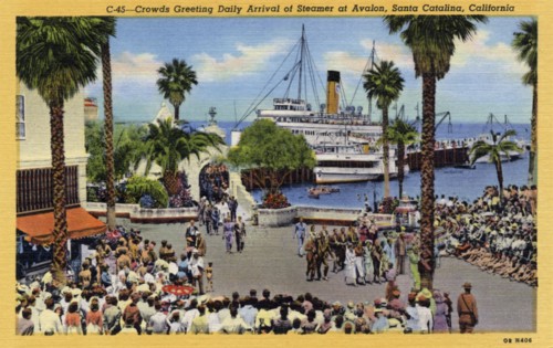 Crowds greet the daily arrival of a steamer, Avalon, Santa Catalina Island, California, USA, 1940. Artist: Unknown