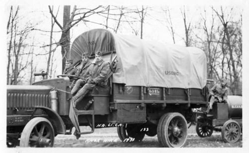 Photo of three soldiers sitting on a truck, Fort Sheridan, Illinois, USA, 1933. Artist: Unknown
