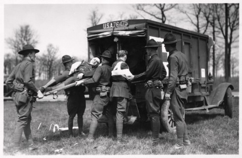 Two wounded soldiers being helped into an ambulance, Fort Sheridan, Illinois, USA, 1930. Artist: Unknown