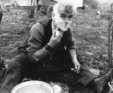 Gypsy man shaving, 1960s.