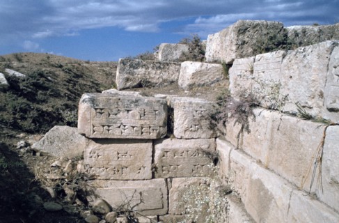 Cuneiform inscriptions on stones, ruined aqueduct, Jerwan, Iraq, 1977.