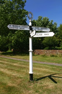 Signpost pointing to Jane Austen's House, Chawton, Hampshire.