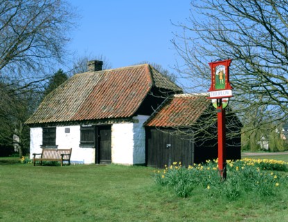 Village sign and smithy, Thriplow, Cambridgeshire.