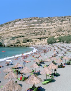 Beach and caves, Matala, Crete, Greece.