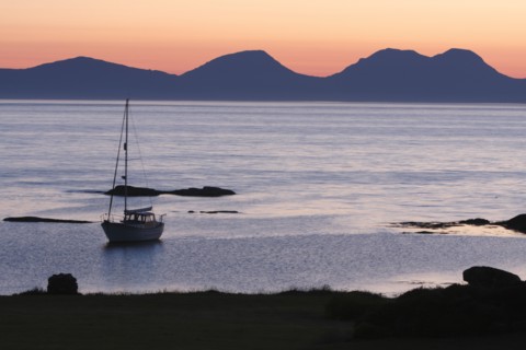 Sunset over Jura seen from Kintyre, Argyll and Bute, Scotland.