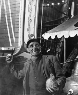 Miner at a fairground, Conisbrough, near Doncaster, South Yorkshire, 1955. Artist: Michael Walters