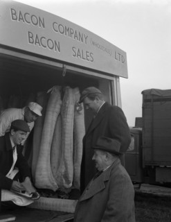 Buying wholesale meat from a Danish Bacon Company lorry, Barnsley, South Yorkshire, 1961. Artist: Michael Walters