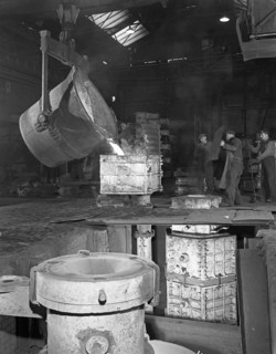 Teeming iron at Wombwell foundry, South Yorkshire, 1963. Artist: Michael Walters