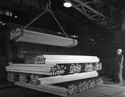 Steel 'H' girders being stacked for distribution, Park Gate, Rotherham, South Yorkshire, 1964. Artist: Michael Walters
