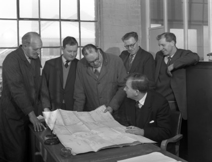 A group of foundry staff with technical drawings, Sheffield, South Yorkshire, 1963. Artist: Michael Walters