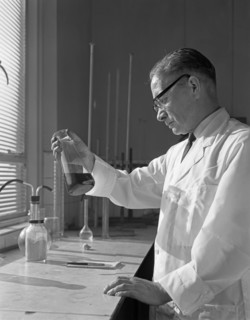 Lab technician at a steelworks in Sheffield, South Yorkshire, 1963. Artist: Michael Walters