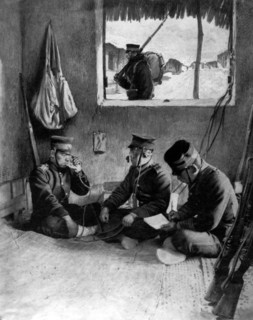 Japanese soldiers using a field telephone to call for reinforcements, Korea. Artist: Unknown