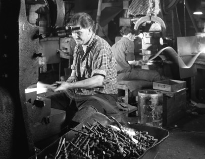 A spring hammer turning drill bits, Footprint Tools, Sheffield, South Yorkshire, 1968. Artist: Michael Walters