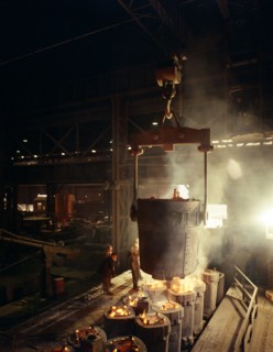 Teeming (pouring) molten iron, Brown Bayley Steels, Sheffield, South Yorkshire, 1968.  Artist: Michael Walters