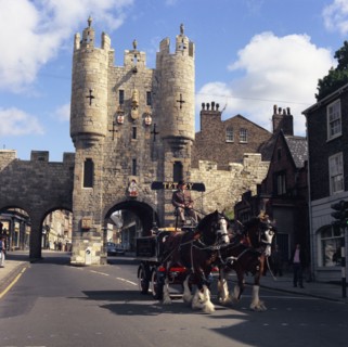 Tetley shire horses and dray in front of Micklegate Bar, York, North Yorkshire, 1969.  Artist: Michael Walters