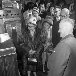 Women in fur coats at a food exhibition, Wilsic, near Doncaster, South Yorkshire, 1961.  Artist: Michael Walters