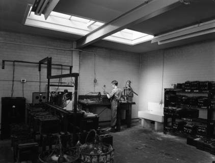Scene in the workshops of Globe & Simpson auto electricians, Lincoln, Lincolnshire, 1961. Artist: Michael Walters
